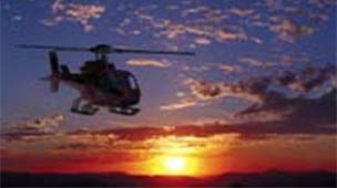 Helikoptertur vid solnedgången Grand Canyon